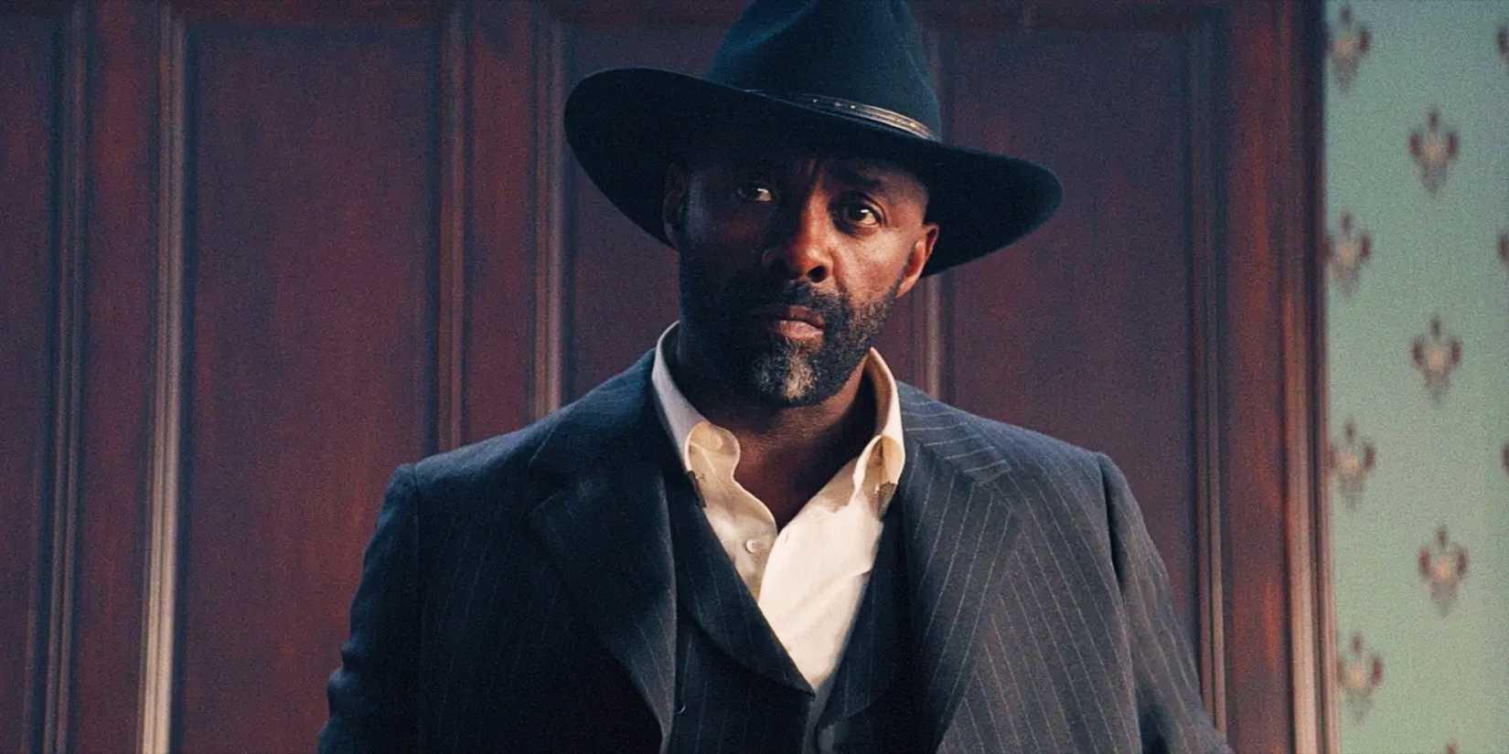 Idris Elba looks on calmly in The Harder They Fall