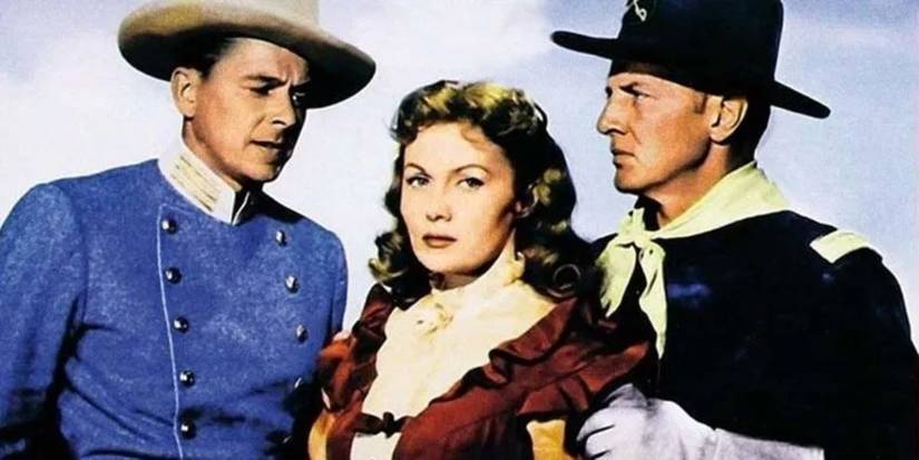 Ronald Reagan posa com outros dois atores em uma imagem promocional para o último posto avançado