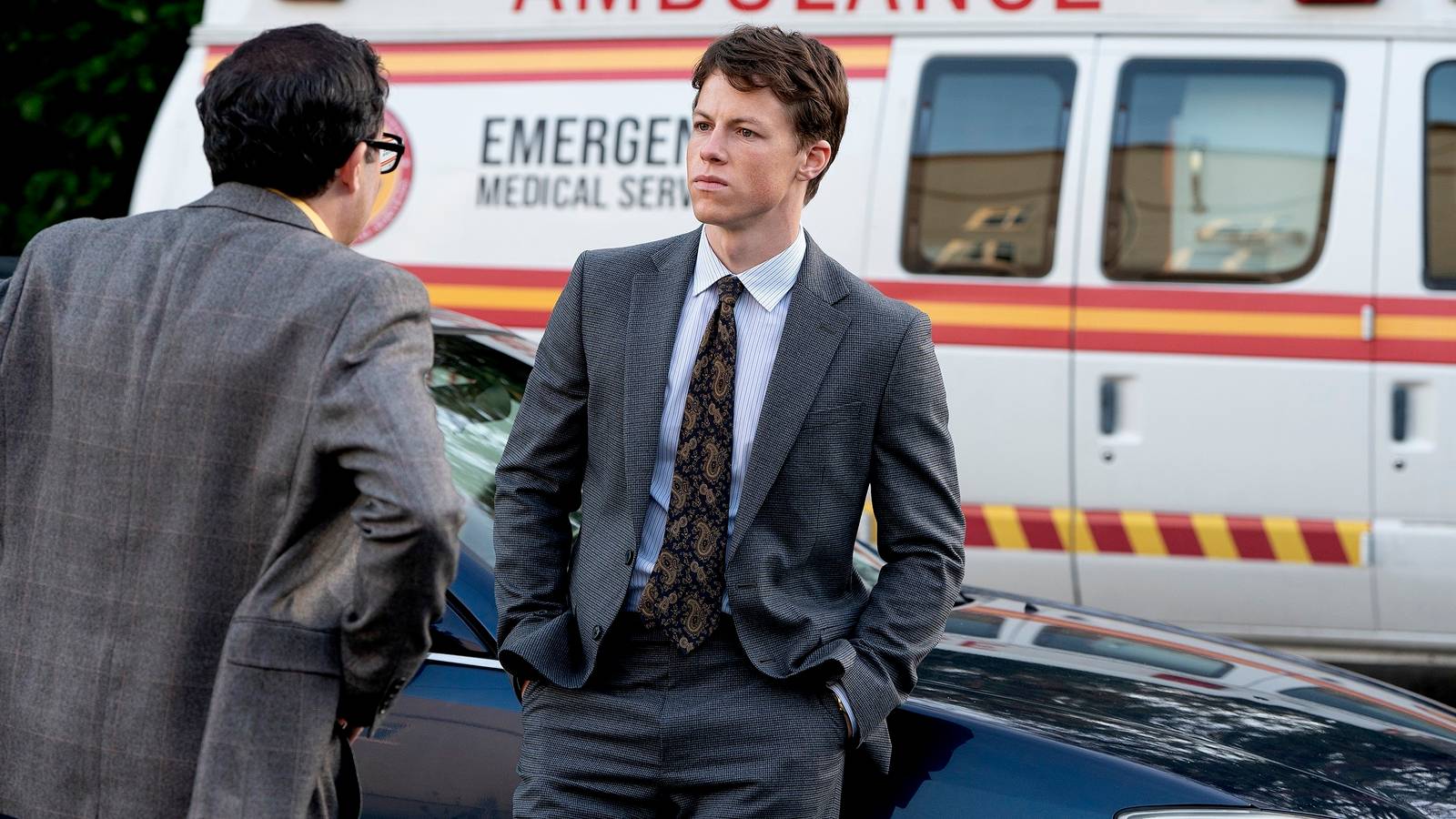 P.J. Byrne as Deck Sifflet and Milo Callaghan as Rudy Baylor in The Rainmaker