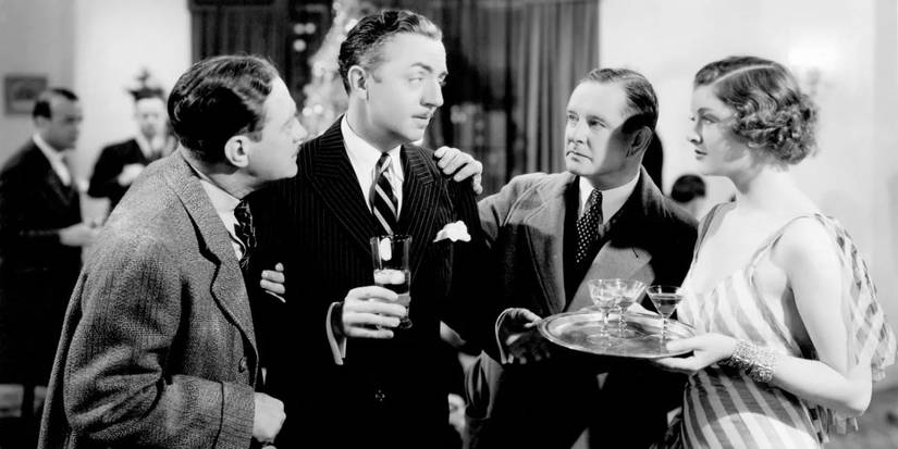 Nick and Nora Charles talk to party guests in The Thin Man