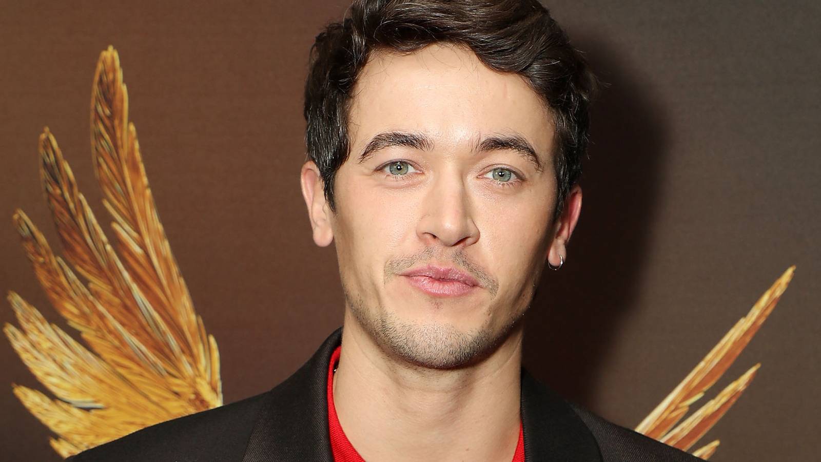 Tom Blyth Reacts To Ralph Fiennes Becoming President Snow In Hunger Games