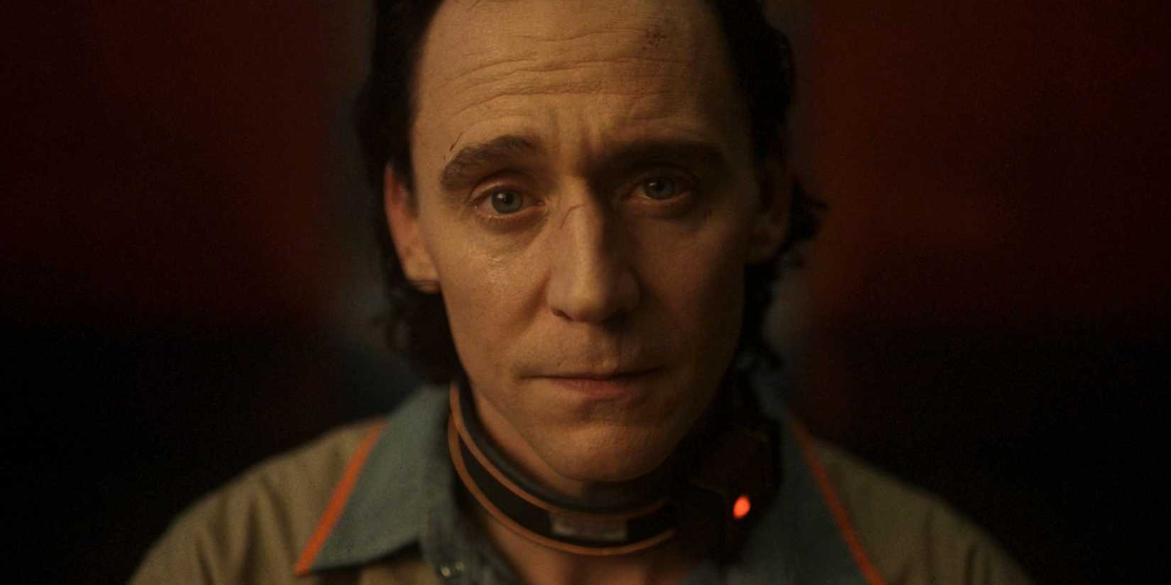 Tom Hiddleston's Loki with a collar and TVA prisoner uniform in Loki season 2