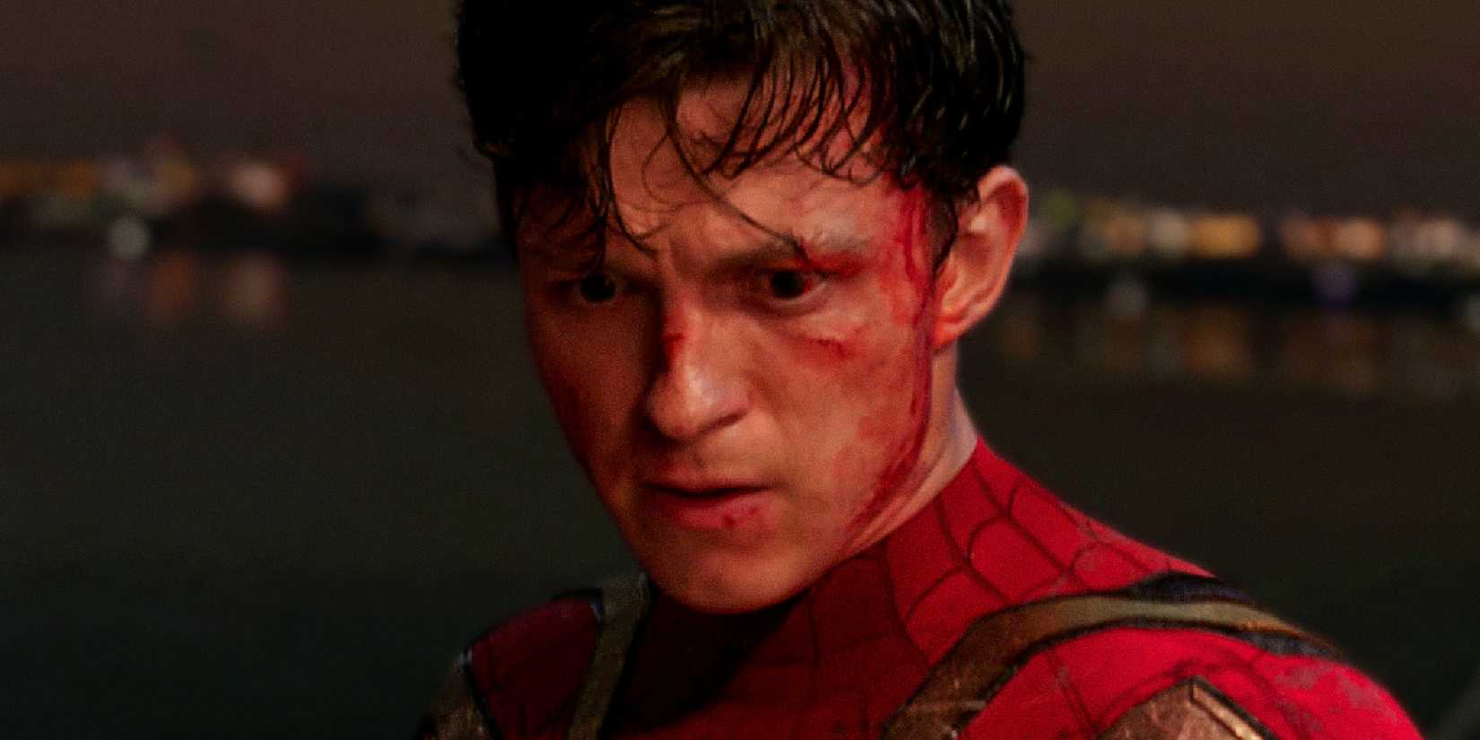 Tom Holland's Peter Parker looks down while bleeding in Spider-Man No Way Home's final battle
