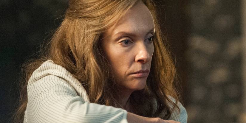 Toni Collette looking concerned in Hereditary