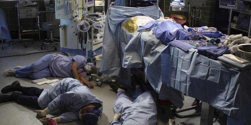  Toxic Blood In The OR Season 3, Episode 14 – “Wishin’ and Hopin’” cast lying on the floor