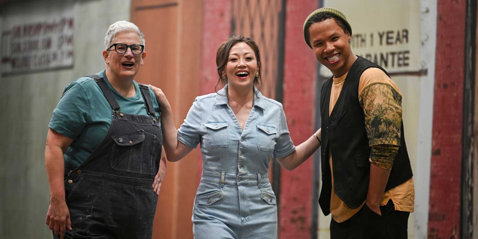 Tracker cast members Abby McEnany, Fiona Rene, and Eric Graise on set laughing