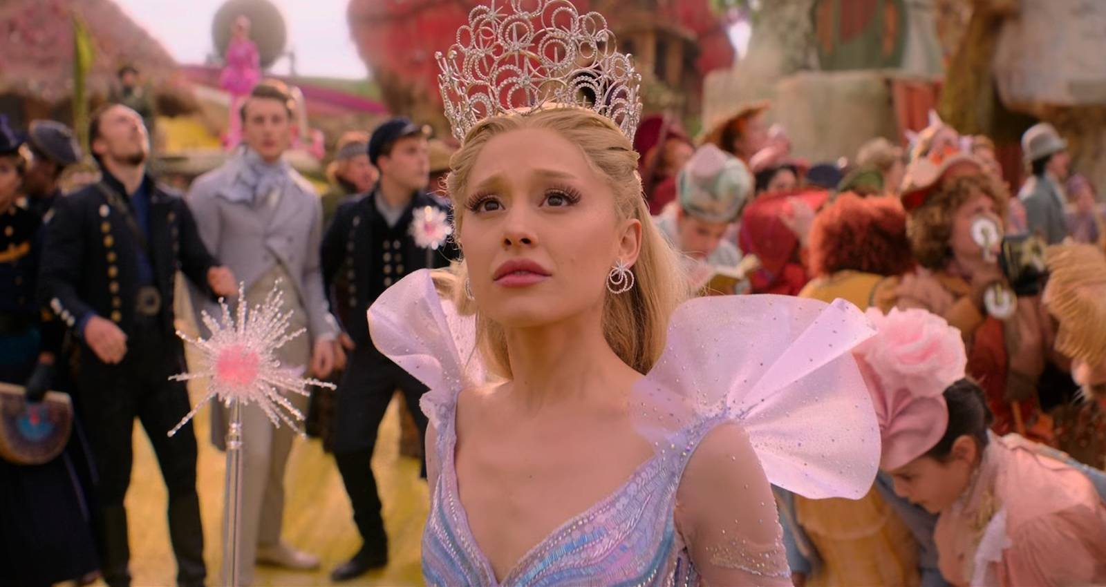 Ariana Grande as Glinda looks up in Munchkinland in Wicked: For Good