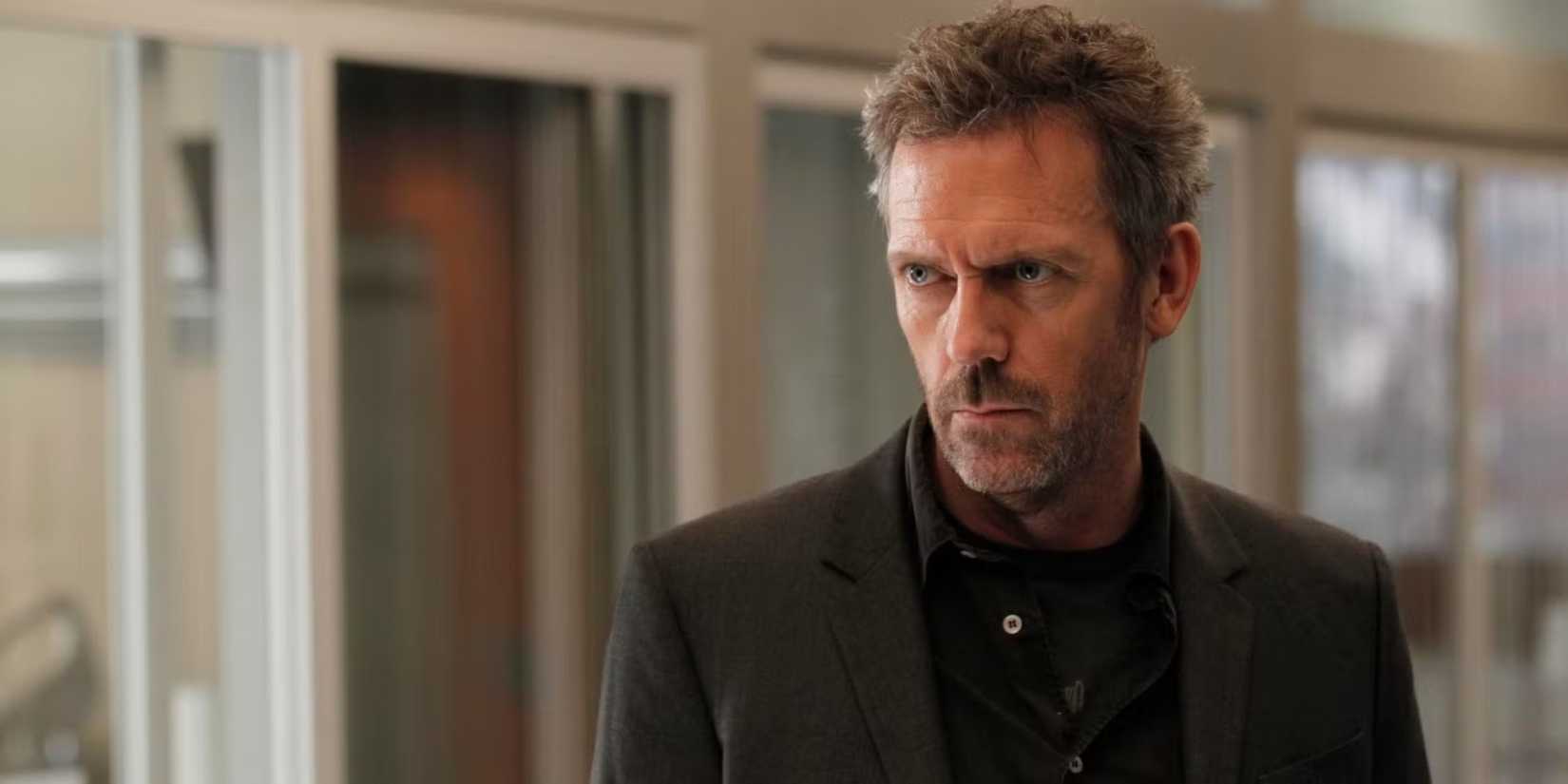 Hugh Laurie como Dr. Gregory House em House