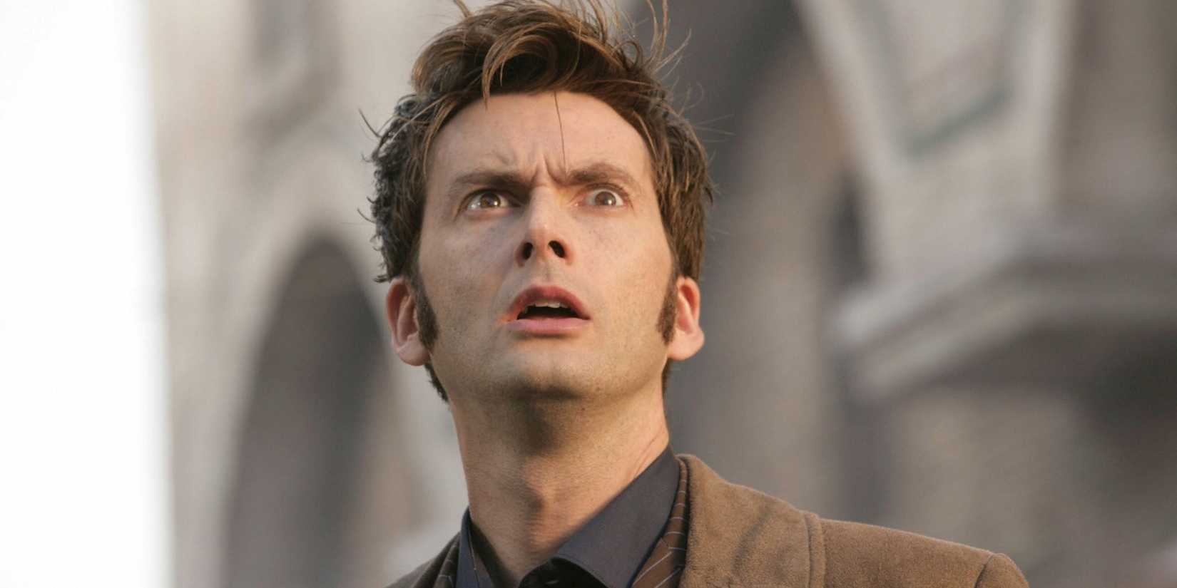 David Tennant as the Tenth Doctor looking shocked as he stares up at the sky in the Doctor Who episode "The Fires of Pompeii."