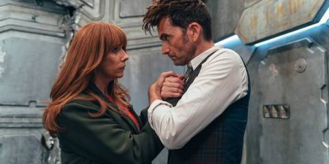 The Fourteenth Doctor and Donna clutching each other after the TARDIS abandons them on the ship in Doctor Who episode 