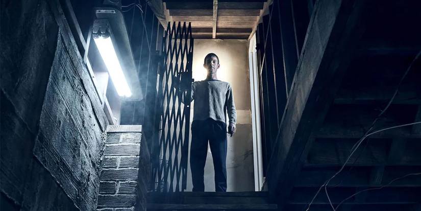 Brady Hartsfield standing menacingly in a doorway in Mr. Mercedes