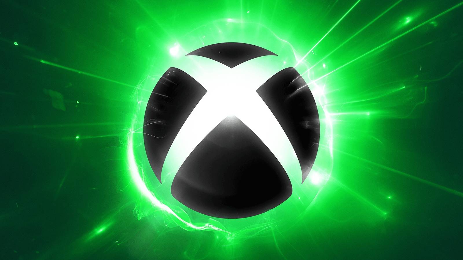 A black Xbox logo has green lights behind it.