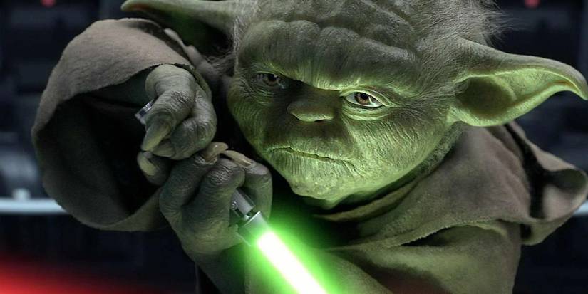 yoda wielding a lightsaber while fighting palpatine in star wars episode 3