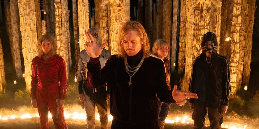 Jimmy Crystal and his group standing in The Bone Temple in 28 Years Later: The Bone Temple.