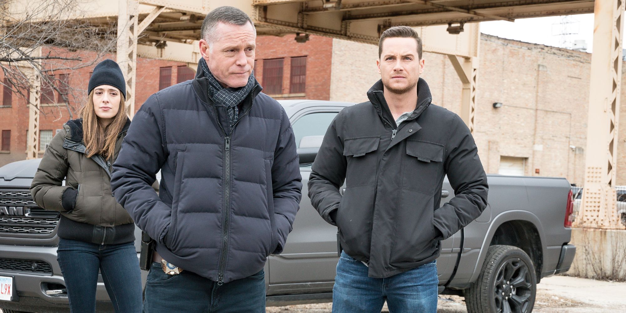 3 Chicago PD Castmembers stand together in the cold