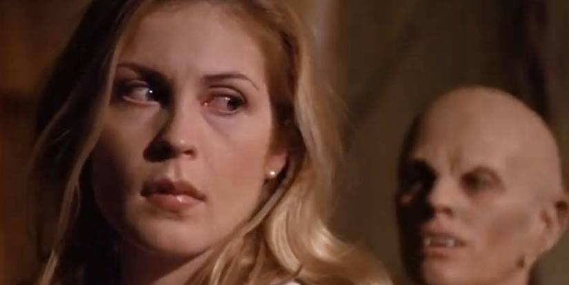 A character from Kindred The Embraced, with a woman looking behind her