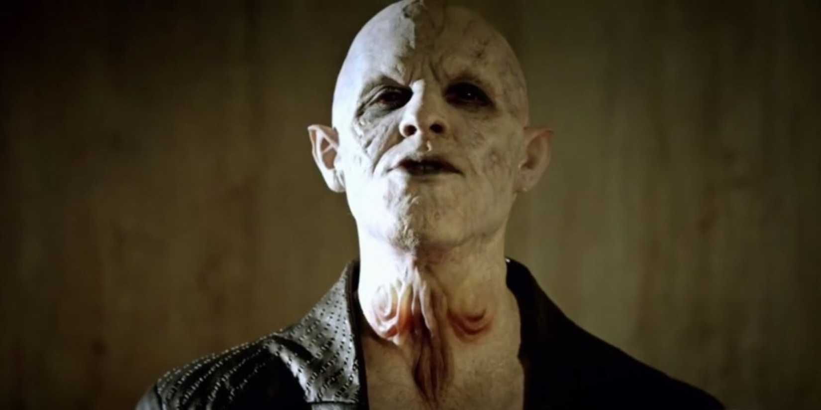 A vampire smiling in tension