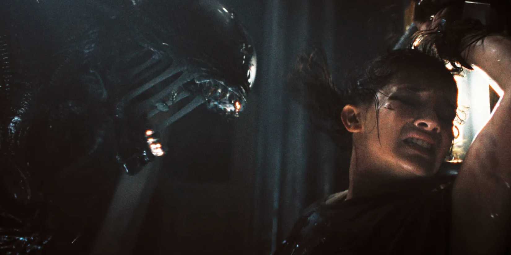A Xenomorph bears down on Cailee Spaeny's Rain in Alien: Romulus