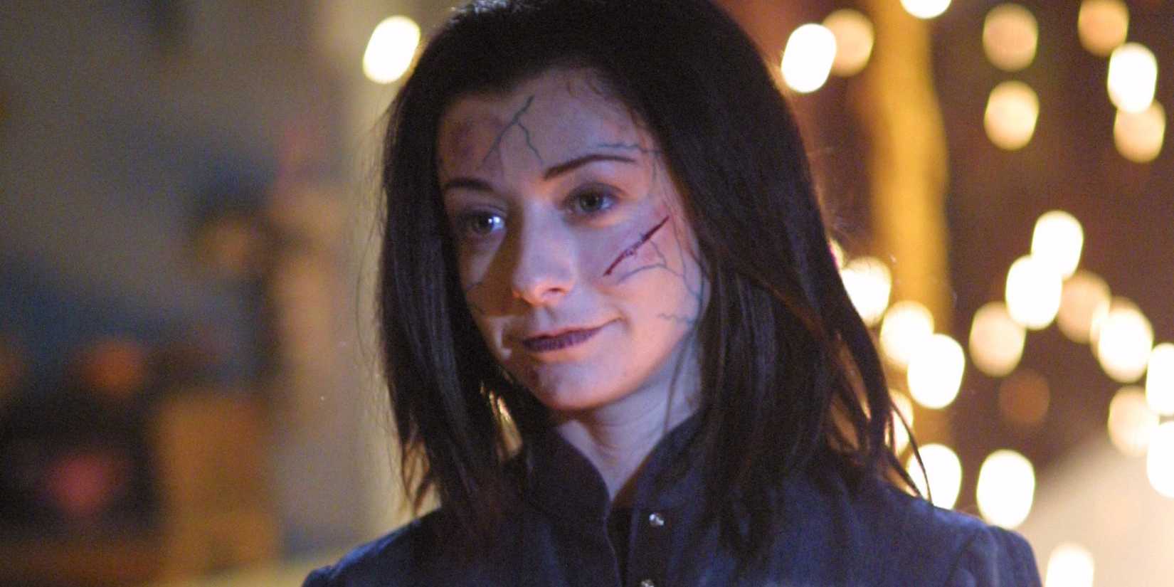 Alyson Hannigan as Dark Willow, scars on her face and hair black, in Buffy tghe Vampire Slayer