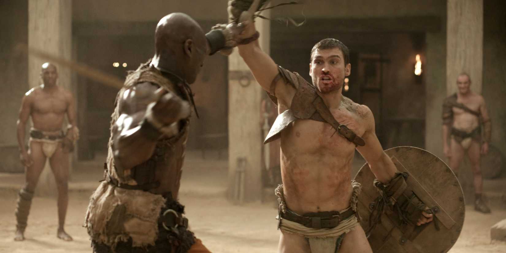 Andy Whitfield (Spartacus) deflecting a sword strike from  Peter Mensah (Doctore)  in Spartacus