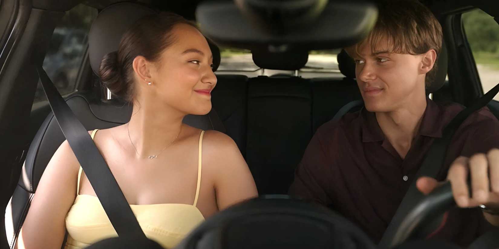 Belly and Conrad sitting in a car and looking at each other in The Summer I Turned Pretty's season 3 finale 