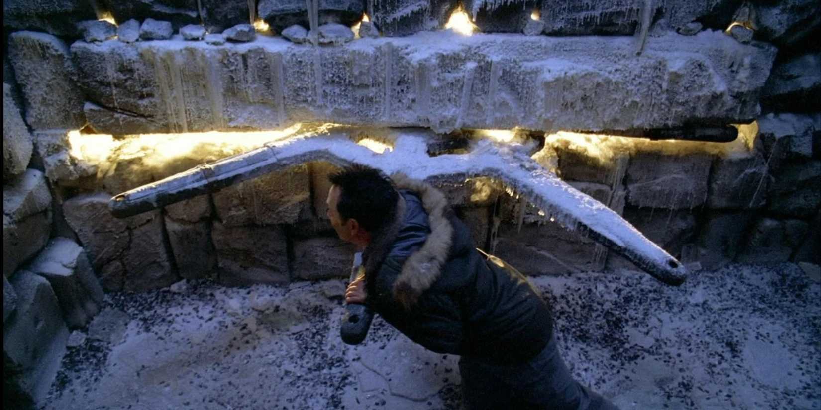 Benjamin Linus pushing the frozen donkey wheel in Lost