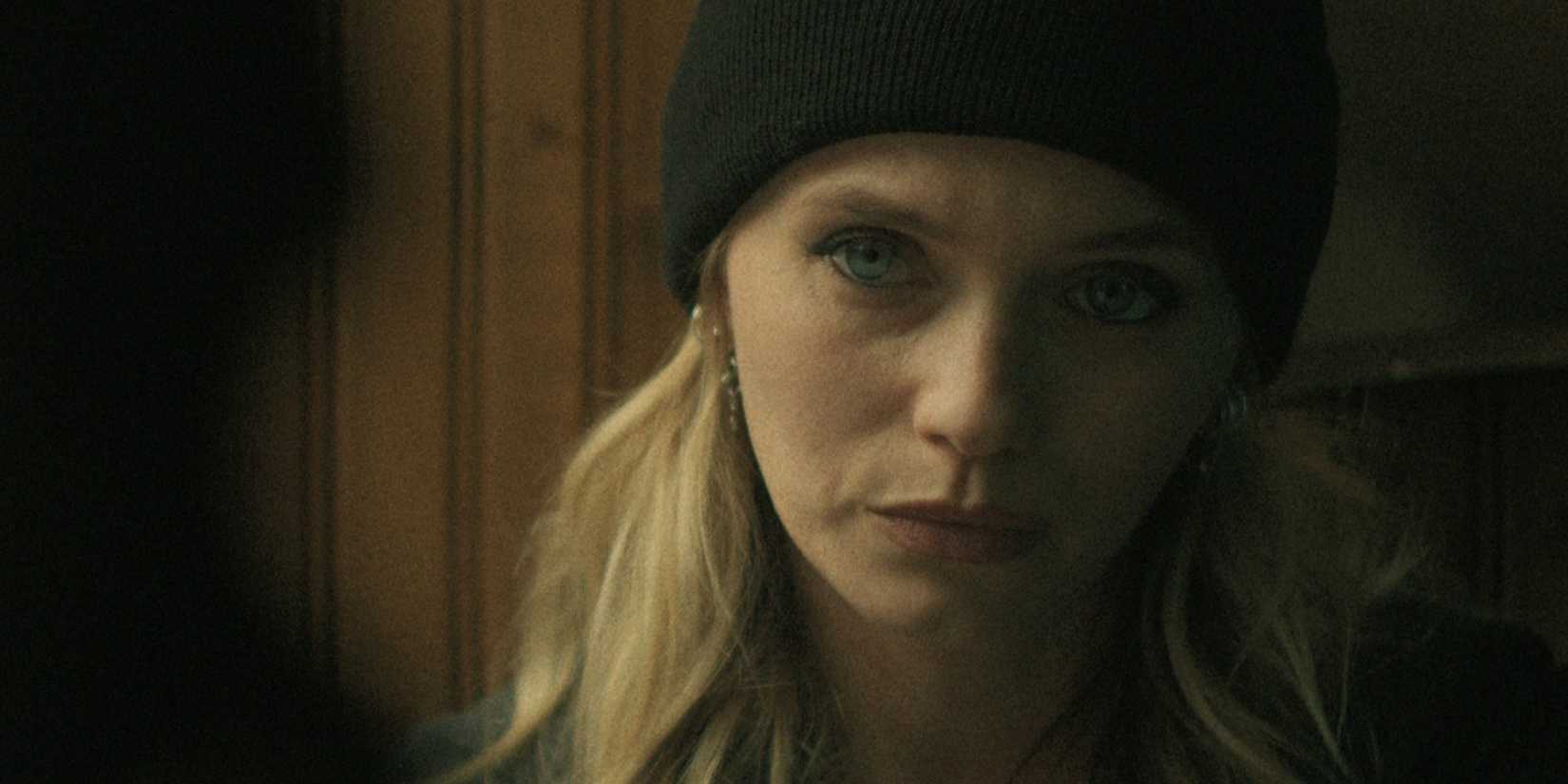 Anna looks serious and upset in Netflix's Black Rabbit