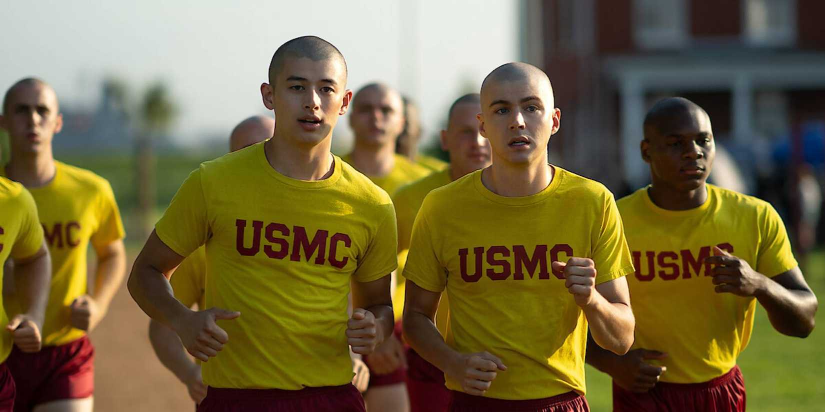 Ray and Cam run in USMC shirts in Boots' trailer