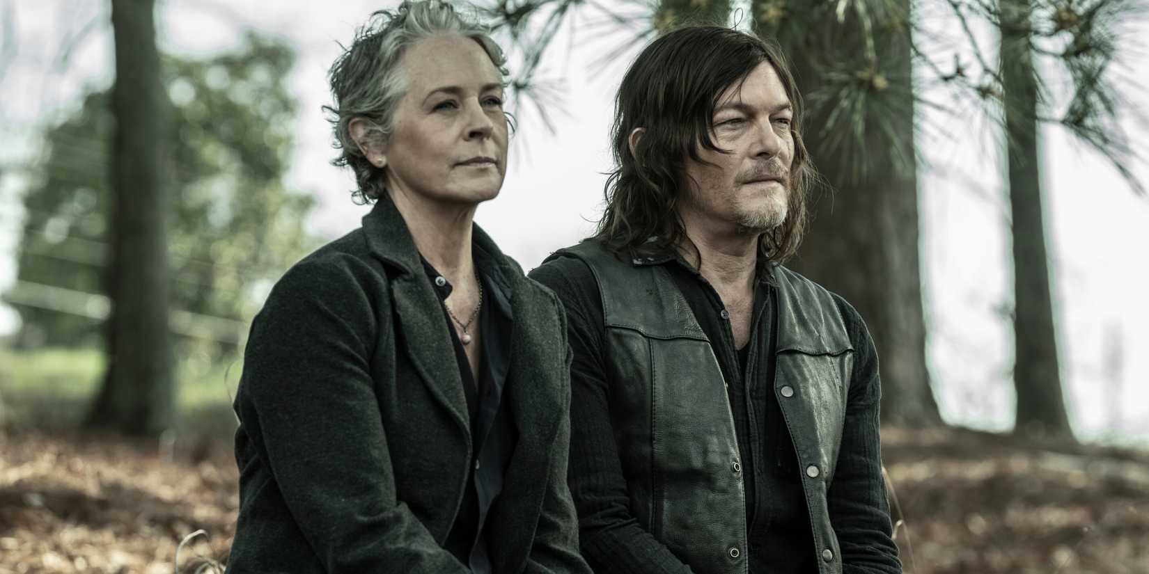 carol and daryl sitting together in the walking dead