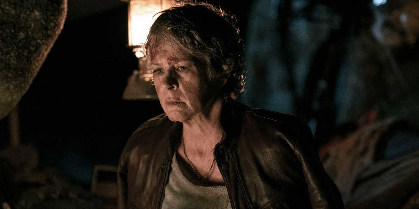 Melissa McBride as Carol looking slightly worried in The Walking Dead: Daryl Dixon season 3, episode 1