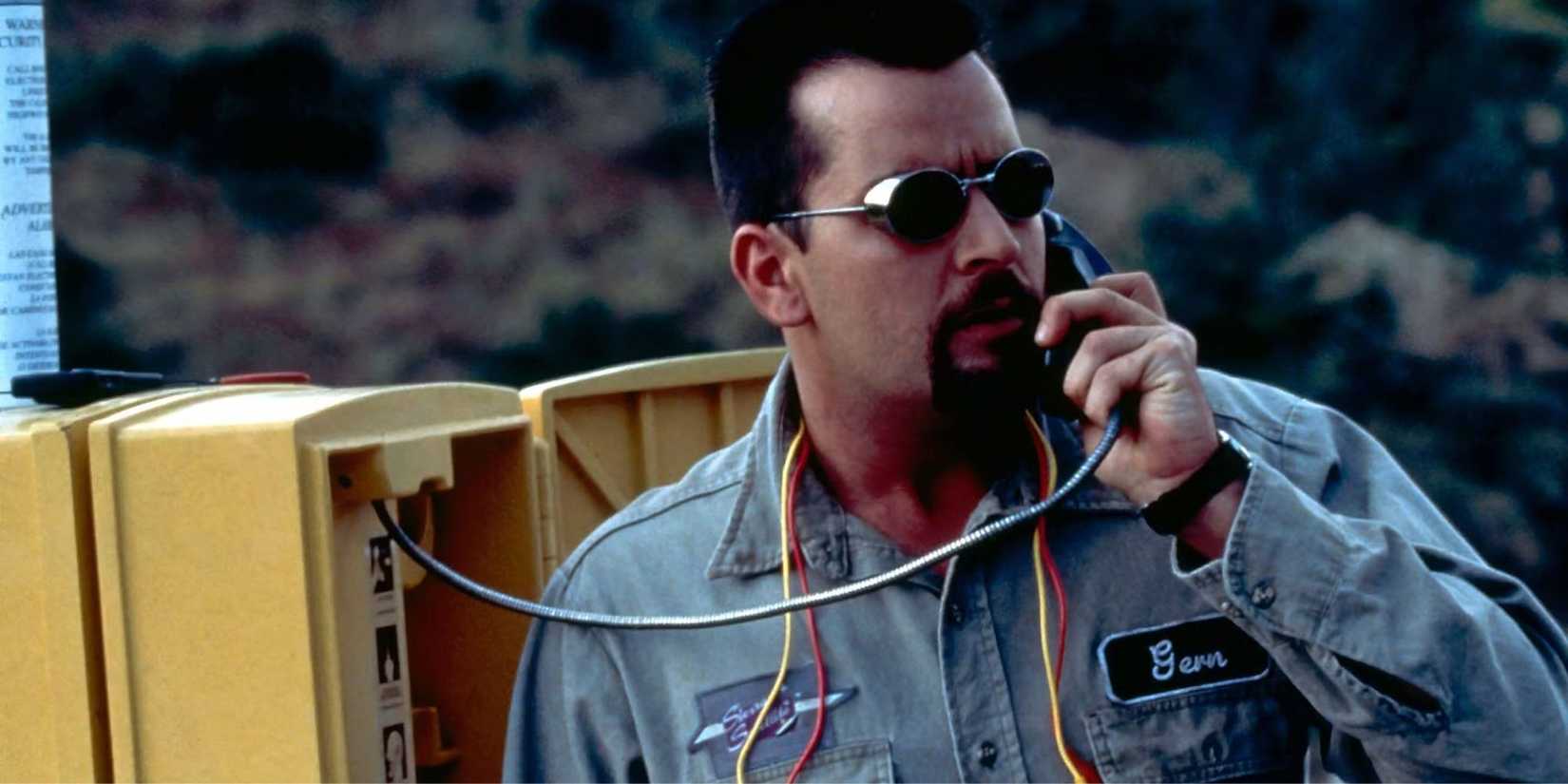 Charlie Sheen as Zane on the phone in The Arrival