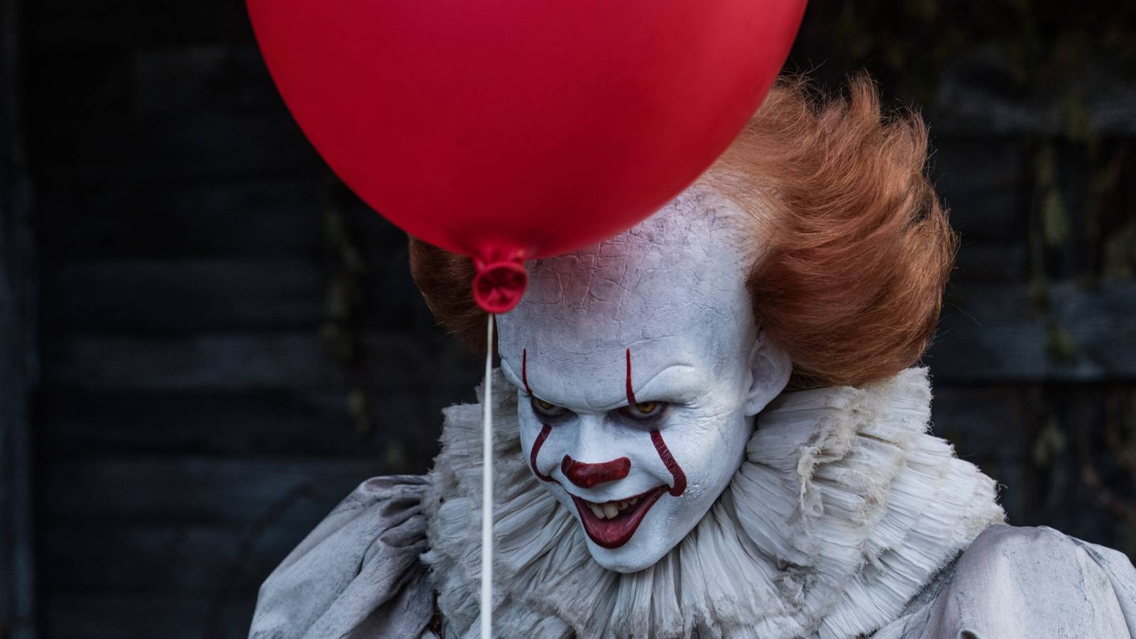 Close up of Pennywise's face in It