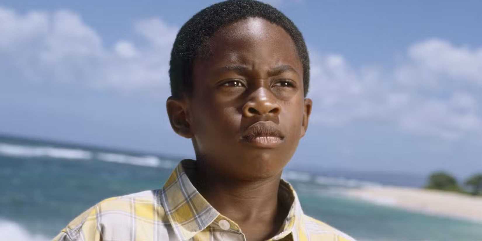 Close-up de Walt Lloyd, interpretado por Malcolm David Kelley, olhando para a distância em Lost