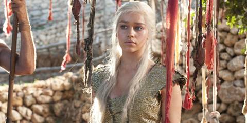 Emilia Clarke as Daenerys frowning in Game of Thrones season 1