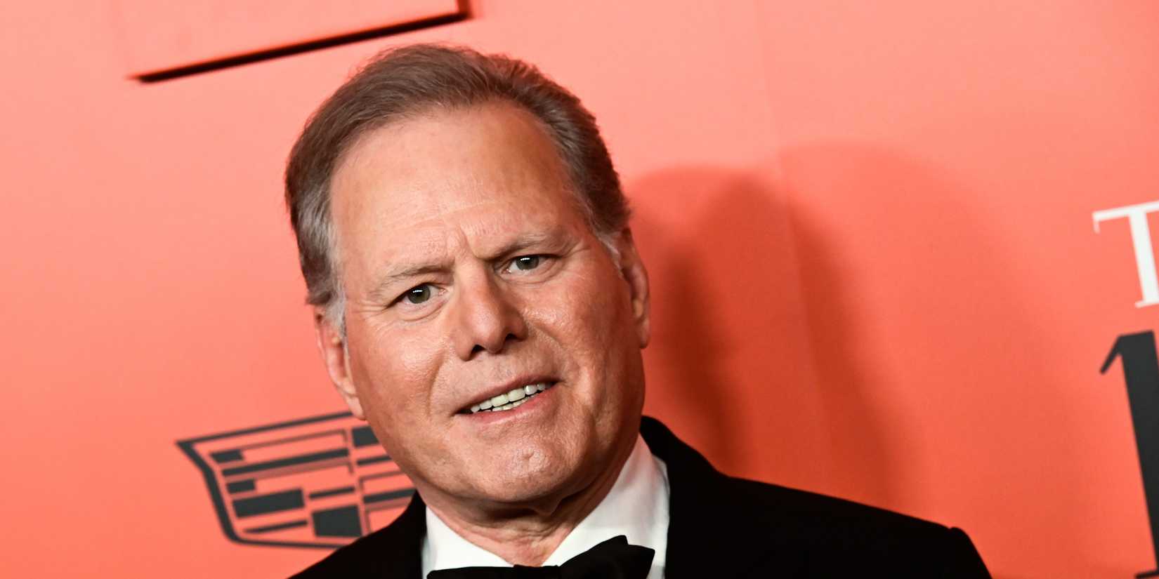 David Zaslav posing on the red carpet