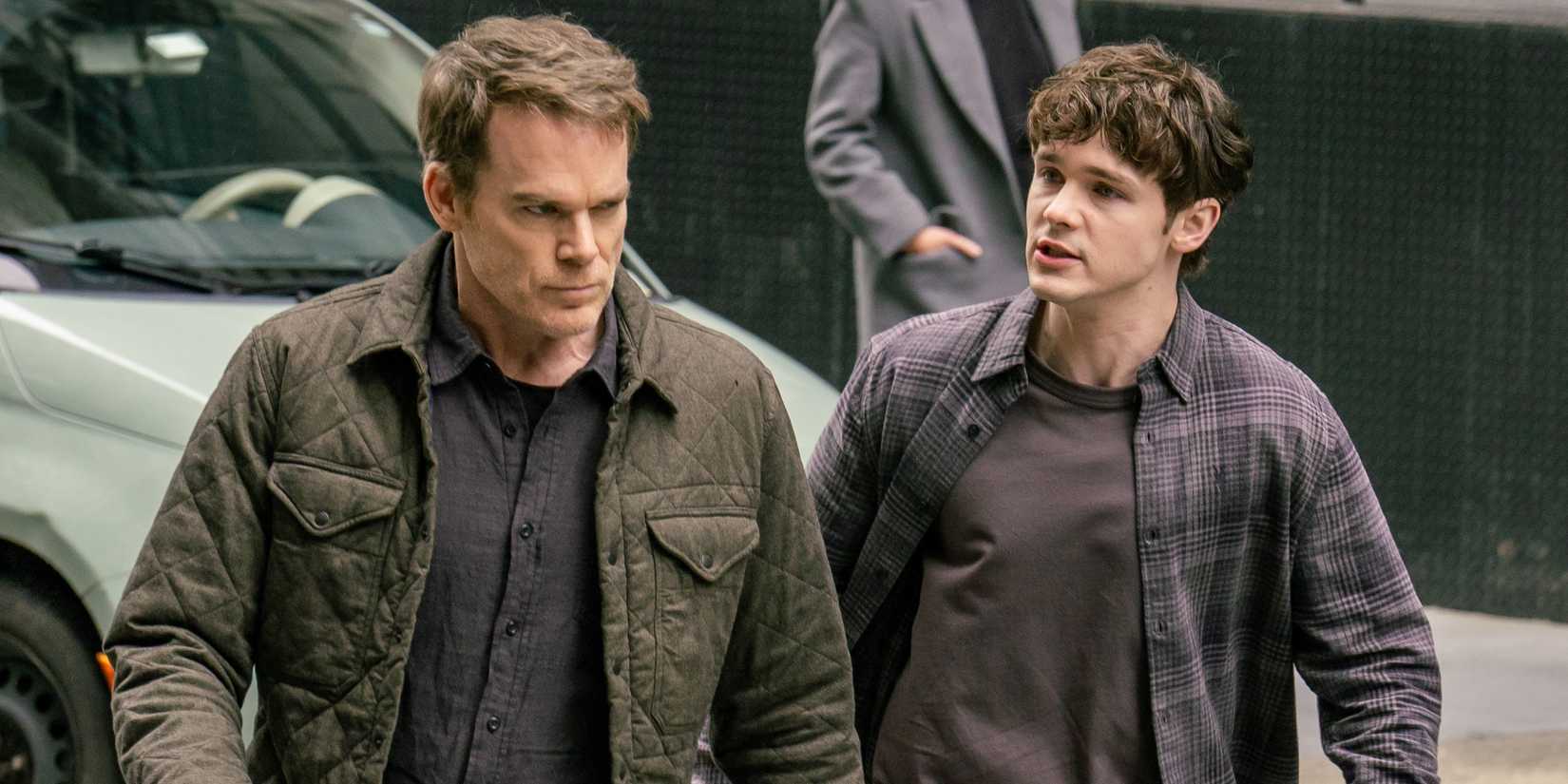 Dexter and Harrison Morgan walking in the street in Dexter Resurrection season 1