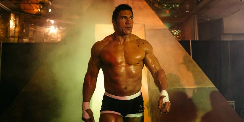 Mark Kerr, as played by Dwayne Johnson, entering the arena on The Smashing Machine
