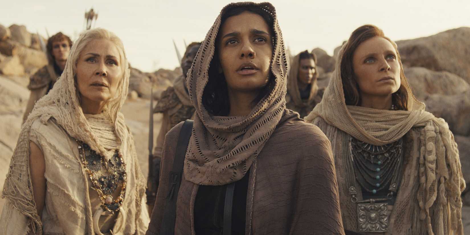 Egwene standing looking at something on The Wheel Of Time