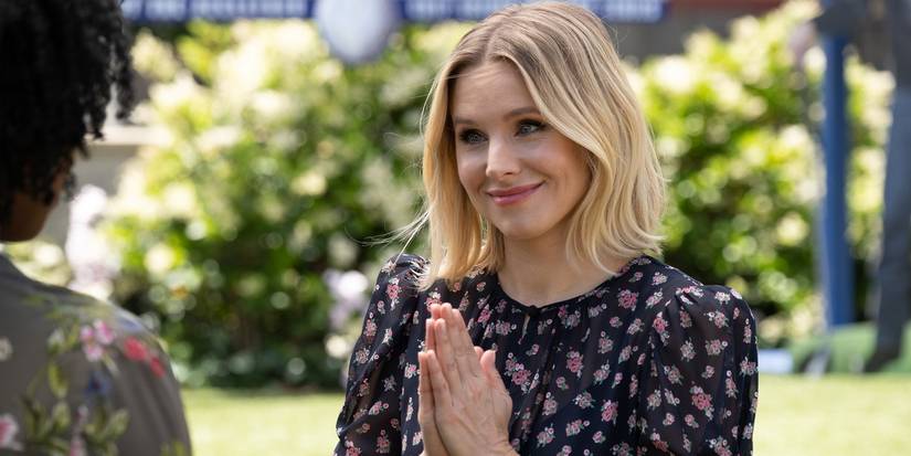 Eleanor Smiling With Her Hands Together In The Good Place