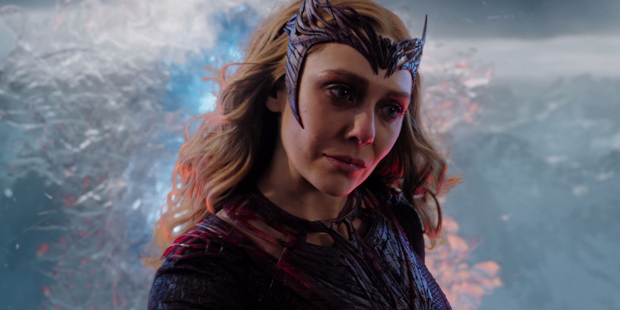 Elizabeth Olsen's Scarlet Witch tilting her head in Doctor Strange in the Multiverse of Madness