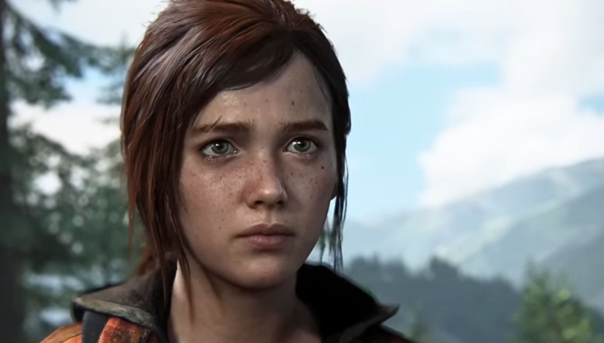 Ellie vicino al fuoco nella foresta ne The Last of Us Part I