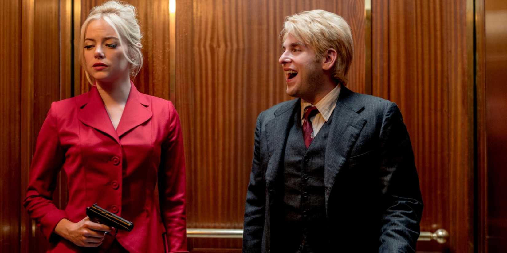 Emma Stone and Jonah Hill in a maniac elevator