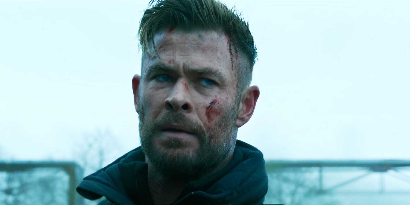 Chris Hemsworth with a bloody face as Tyler Rake in Extraction 2