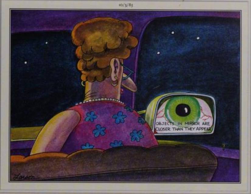 Far Side, October 3, 1985, a giant monstrous eyeball appears in a woman's side mirror