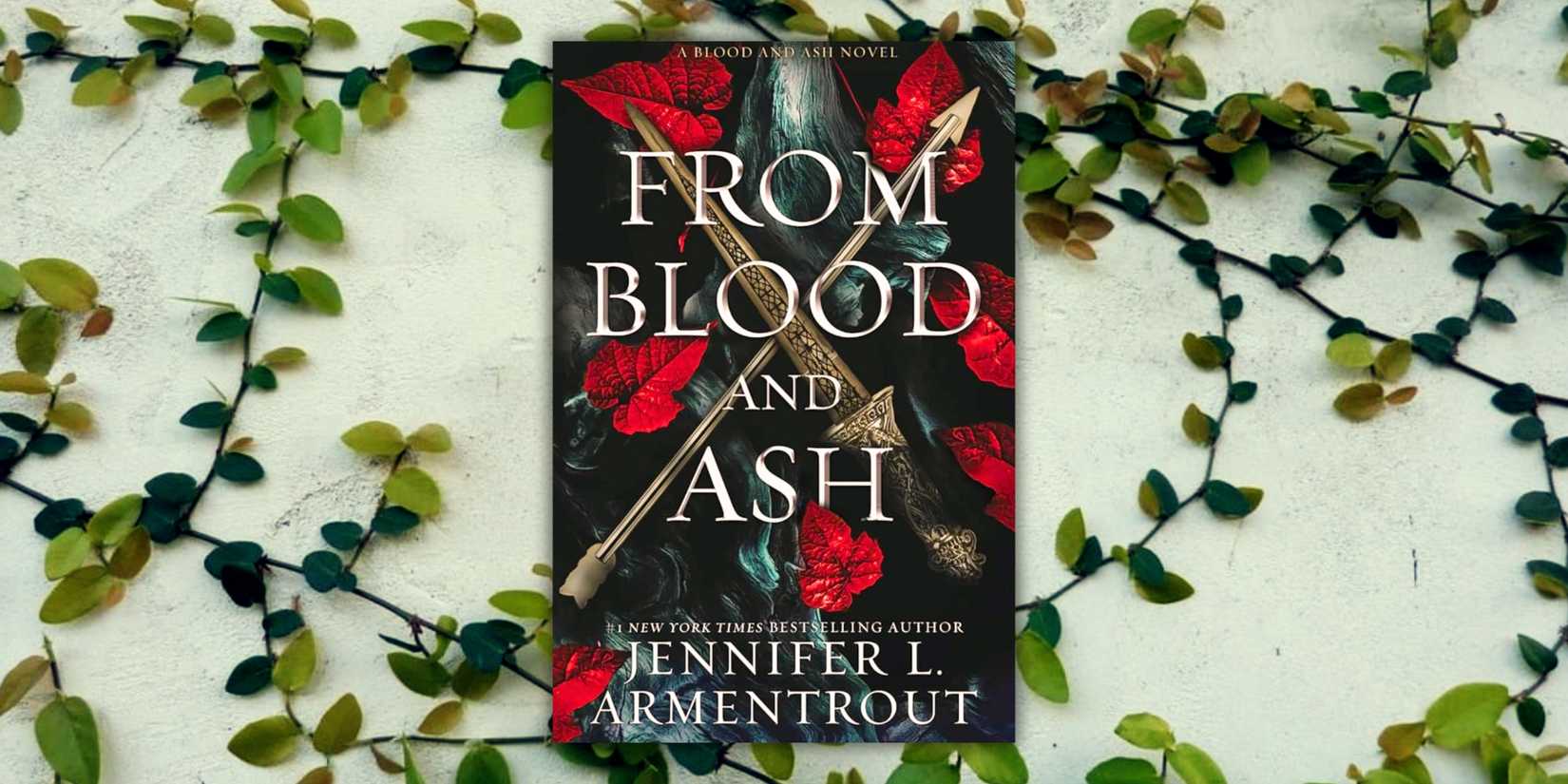 The book cover of From Blood And Ash over a wall of vines