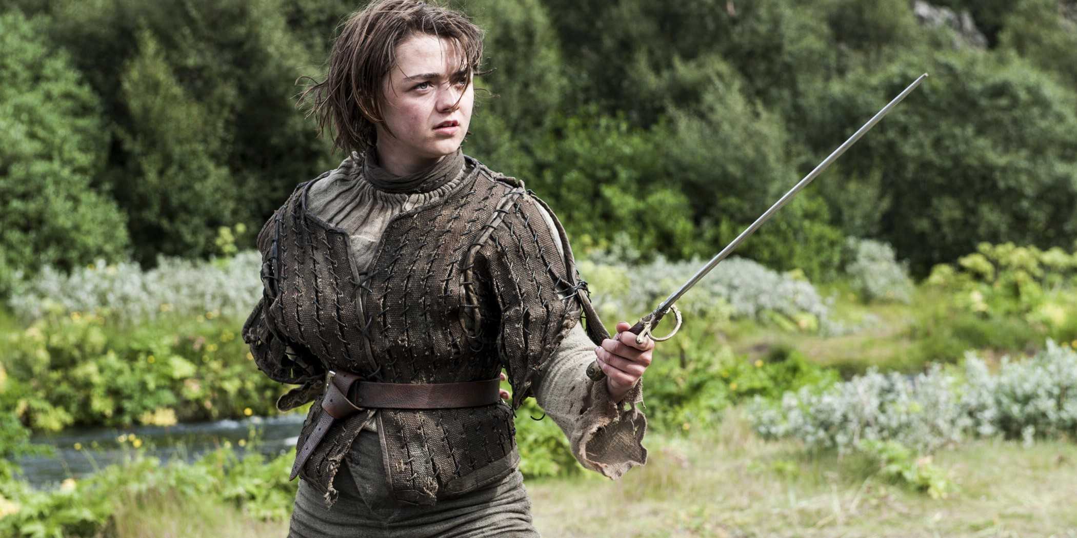 Maisie Williams as Arya Stark holding Needle in Game of Thrones