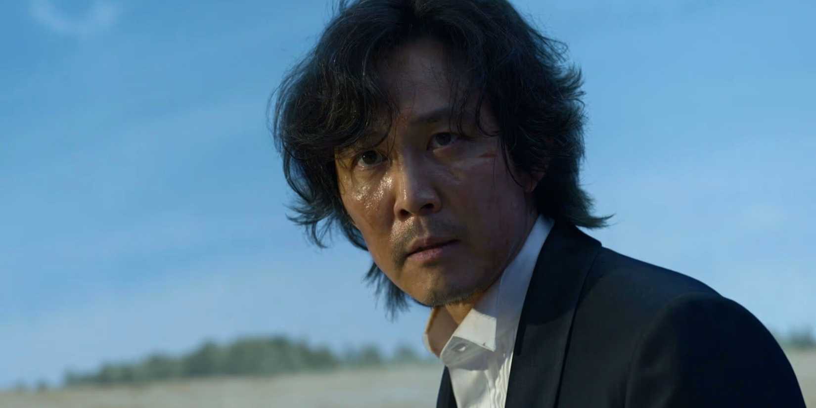 Gi-hun looking angry and disheveled In Squid Game Season 1 Finale