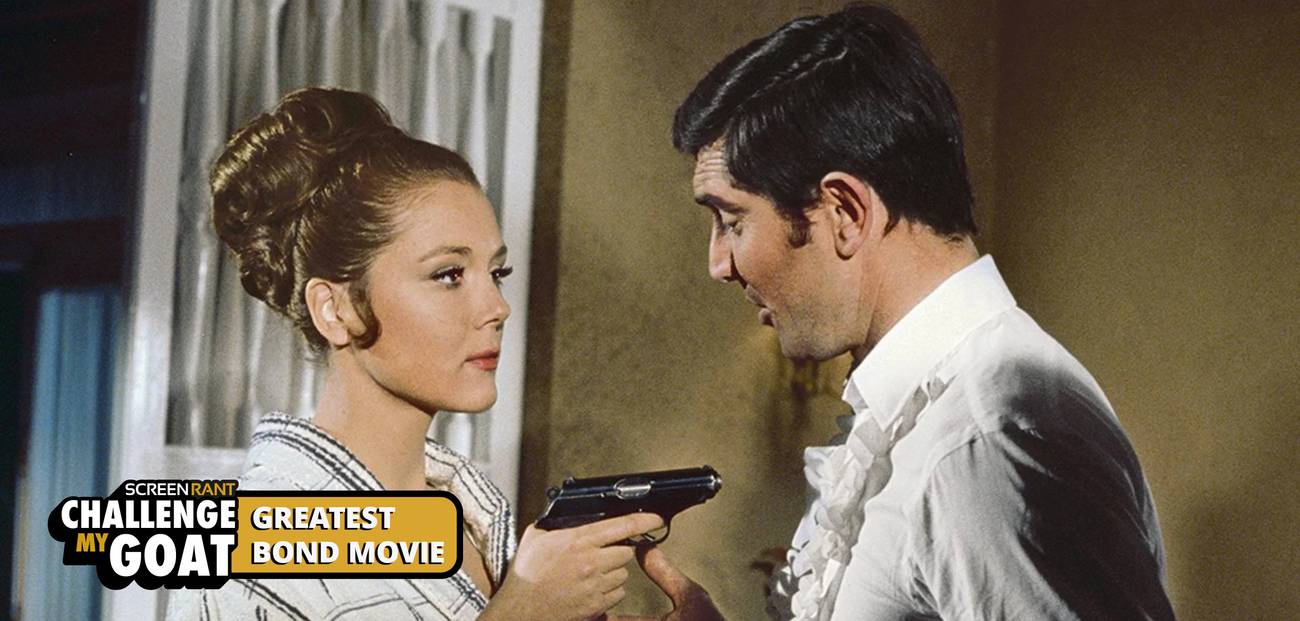 Diana Rigg, as Countess Tracy di Vicenzo, holding a gun at James Bind, played by George Lazenby.
