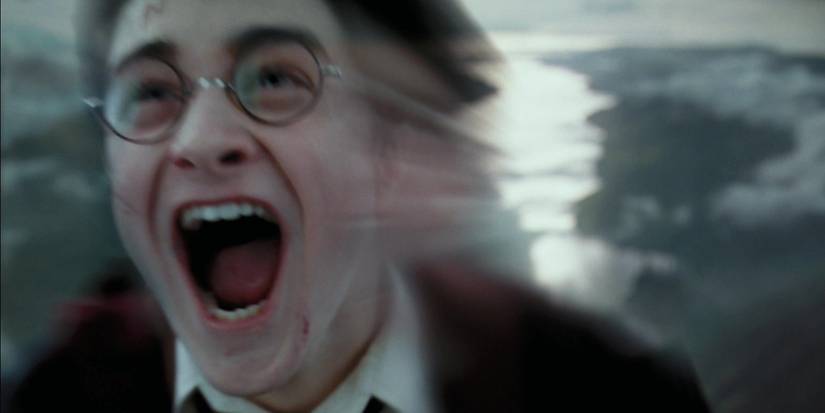 Harry Potter happily screaming while riding his broom at the end of Prisoner of Azkaban