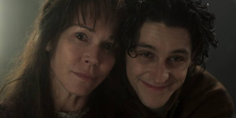 Isaac and Francoise embracing one another in Wednesday